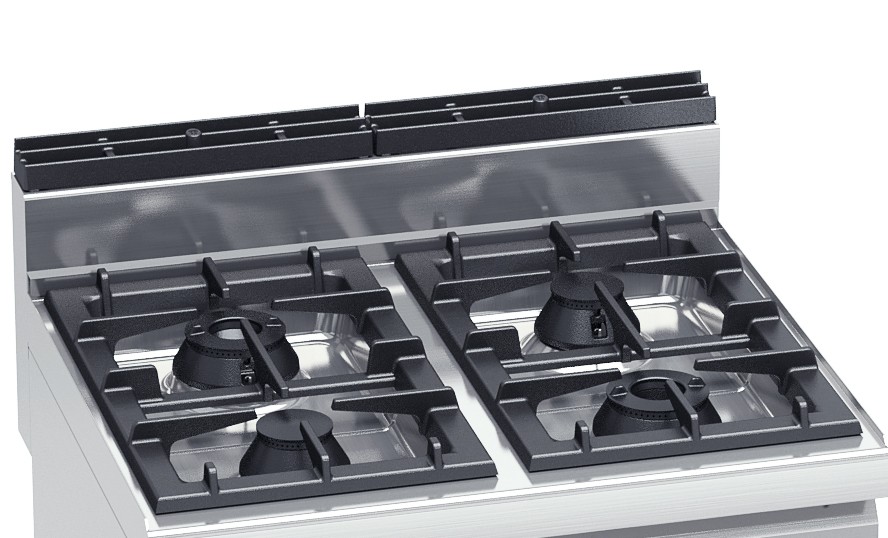 Cast iron pan supports over the two stainless steel burner trays